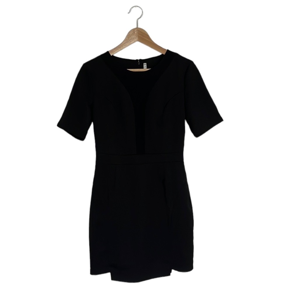 Black dress. Worn once. Looks new. Zipper detail on back.